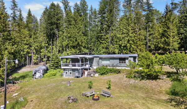 1136 36th Ave Erickson Acreage with Natural Pond-Backs on to Crown Land