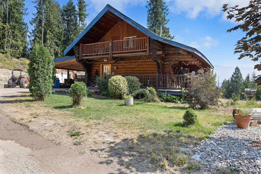 SOLD! 165 Reclamation Road: Handcrafted Log home on 9.2 acres