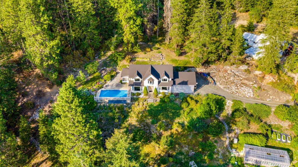 6170 HWY 3A-Refined Wynndel Acreage with Pool, Panoramic Views & Productive Gardens